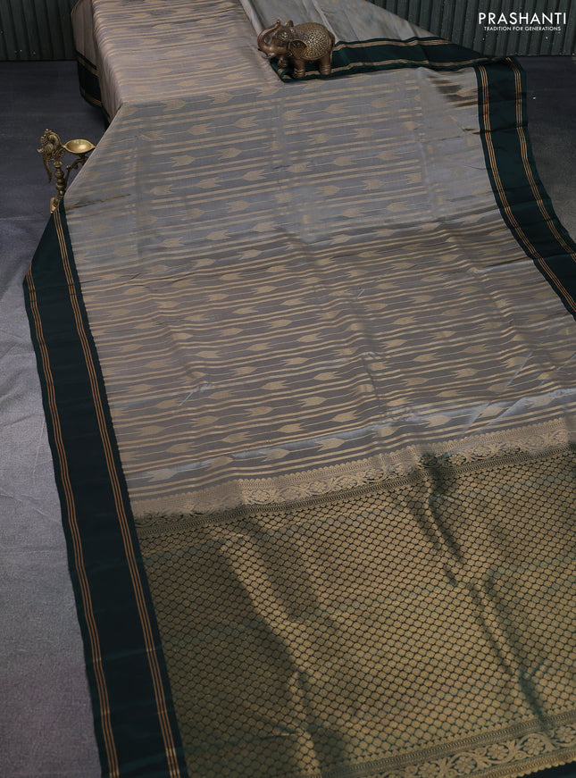 Kanchipuram silk saree grey and dark green with allover zari weaves and rettapet zari woven border