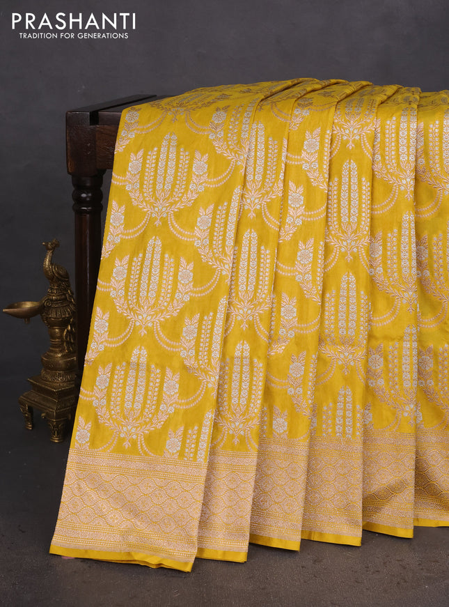 Banarasi uppada silk saree yellow with allover silver & gold zari woven brocade weaves and zari woven border