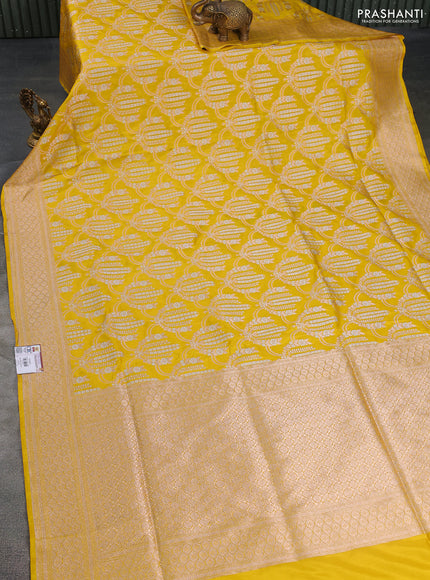 Banarasi uppada silk saree yellow with allover silver & gold zari woven brocade weaves and zari woven border