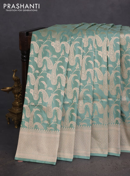 Banarasi uppada silk saree pastel green with allover zari woven paisley brocade weaves and zari woven border