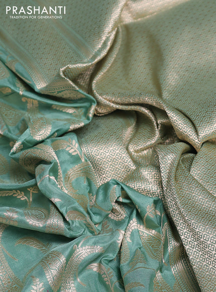 Banarasi uppada silk saree pastel green with allover zari woven paisley brocade weaves and zari woven border