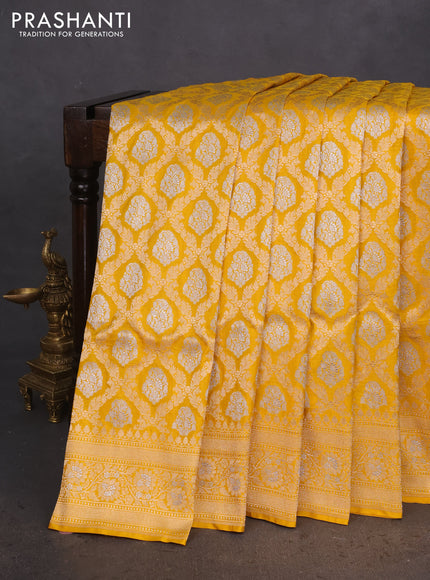 Banarasi uppada silk saree yellow with allover silver & gold zari woven brocade weaves and zari woven border