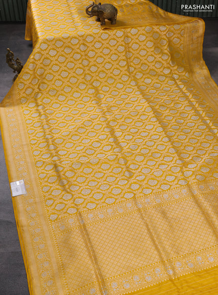 Banarasi uppada silk saree yellow with allover silver & gold zari woven brocade weaves and zari woven border