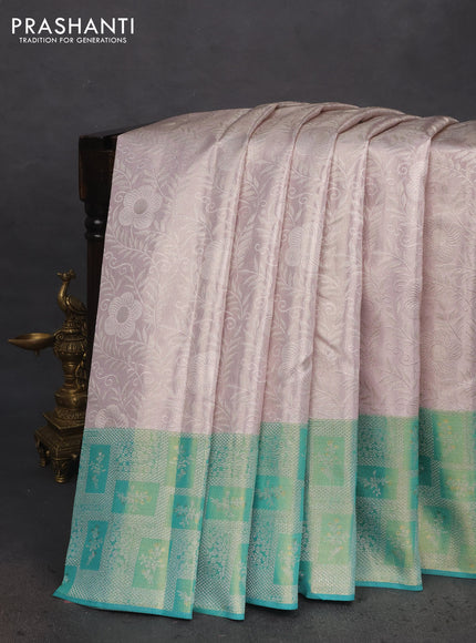 Pure kanchipuram tissue silk saree pastel grey and teal green with allover silver zari woven brocade weaves and silver zari woven border