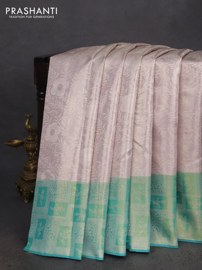 Pure kanchipuram tissue silk saree pastel grey and teal green with allover silver zari woven brocade weaves and silver zari woven border