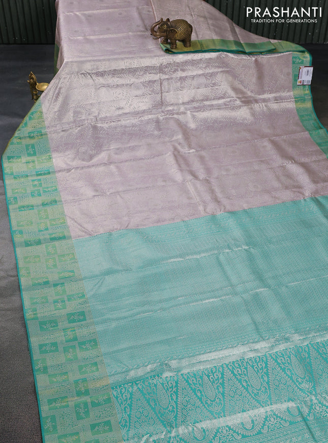 Pure kanchipuram tissue silk saree pastel grey and teal green with allover silver zari woven brocade weaves and silver zari woven border