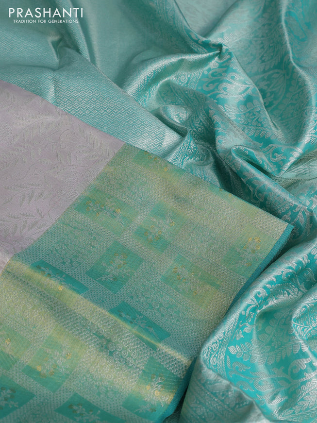 Pure kanchipuram tissue silk saree pastel grey and teal green with allover silver zari woven brocade weaves and silver zari woven border