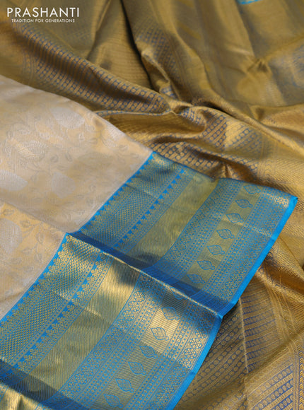 Pure kanchipuram tissue silk saree gold and cs blue with allover silver zari woven brocade weaves and zari woven border