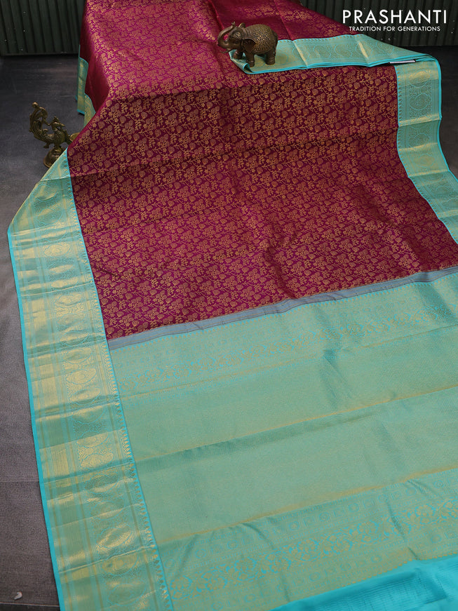 Pure kanchipuram silk saree deep purple and teal blue with allover zari woven brocade weaves and zari woven border