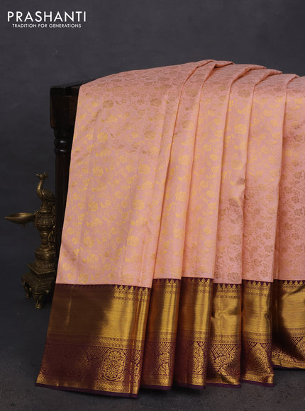 Pure kanchipuram silk saree peach shade and wine shade with allover zari woven brocade weaves and zari woven border