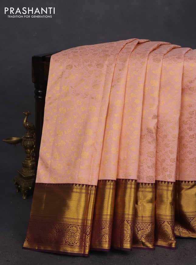 Pure kanchipuram silk saree peach shade and wine shade with allover zari woven brocade weaves and zari woven border