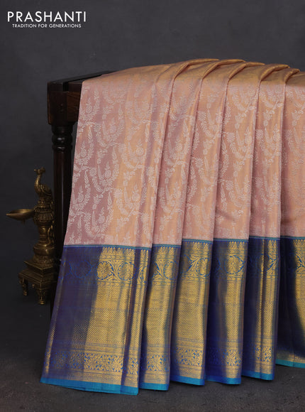 Pure kanchipuram tissue silk saree mild peach and dual shade of bluish green with allover silver zari woven brocade weaves and long zari woven border