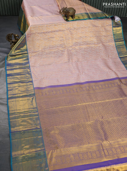 Pure kanchipuram tissue silk saree mild peach and dual shade of bluish green with allover silver zari woven brocade weaves and long zari woven border