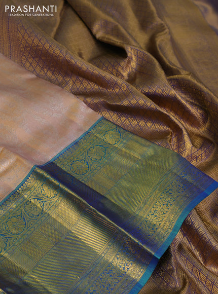 Pure kanchipuram tissue silk saree mild peach and dual shade of bluish green with allover silver zari woven brocade weaves and long zari woven border
