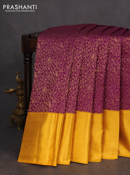 Pure kanchipuram silk saree deep purple and mustard yellow with allover zari woven brocade weaves and zari woven border