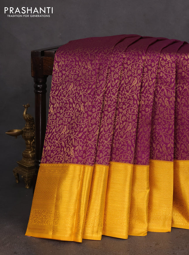 Pure kanchipuram silk saree deep purple and mustard yellow with allover zari woven brocade weaves and zari woven border