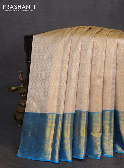 Pure kanchipuram tissue silk saree gold and cs blue with allover silver zari woven brocade weaves and zari woven border