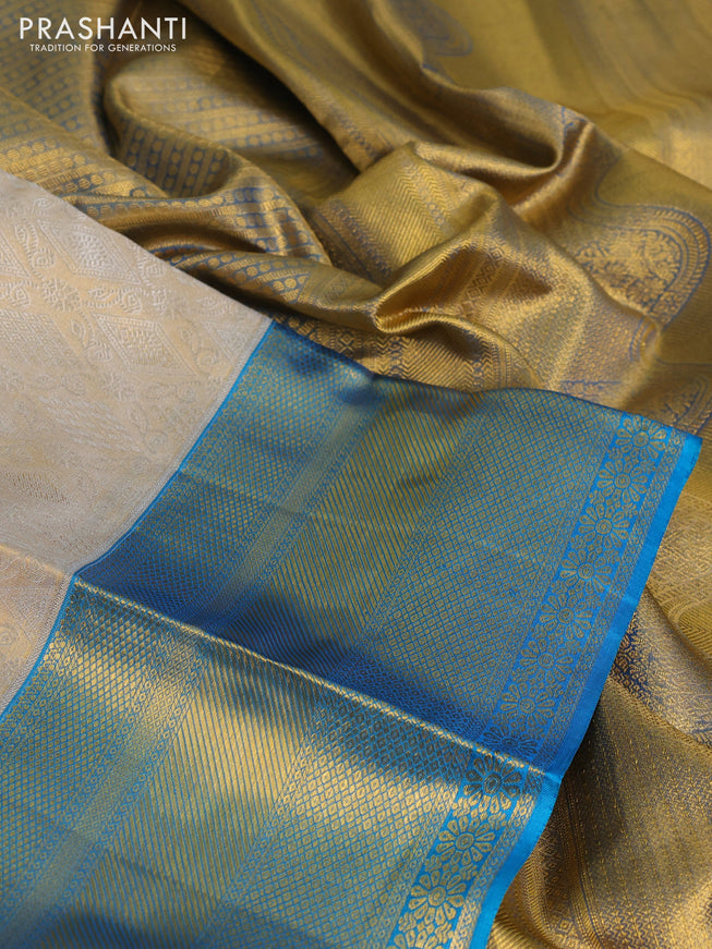 Pure kanchipuram tissue silk saree gold and cs blue with allover silver zari woven brocade weaves and zari woven border
