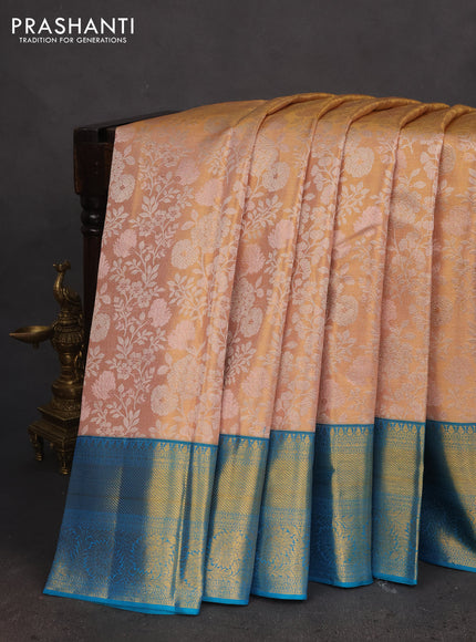 Pure kanchipuram tissue silk saree dual shade of gold and cs blue with allover silver zari woven brocade weaves and zari woven border