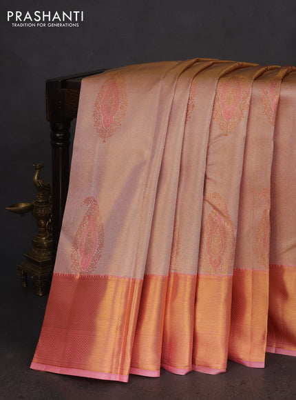 Pure kanchipuram tissue silk saree dual shade of peach pink with allover zari woven brocade weaves and zari woven border