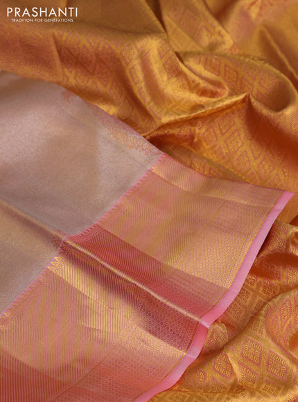 Pure kanchipuram tissue silk saree dual shade of peach pink with allover zari woven brocade weaves and zari woven border