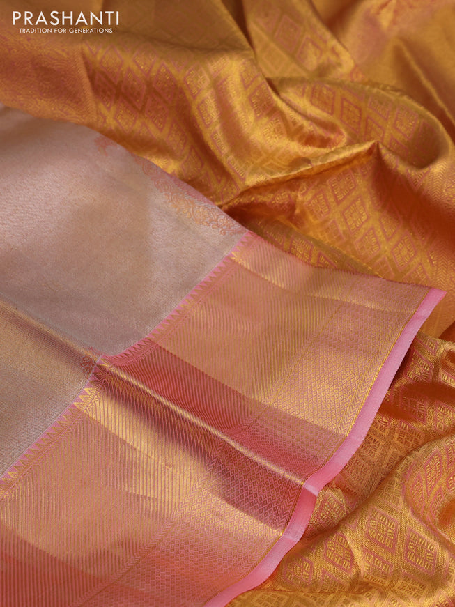 Pure kanchipuram tissue silk saree dual shade of peach pink with allover zari woven brocade weaves and zari woven border