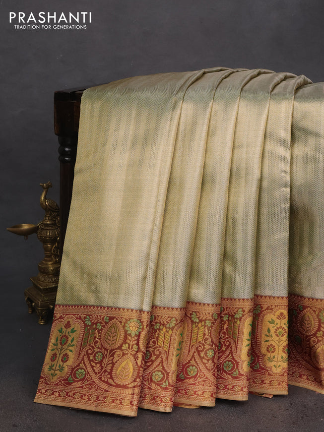 Pure kanchipuram tissue silk saree green shade and maroon with allover zari woven brocade weaves and rich zari woven border