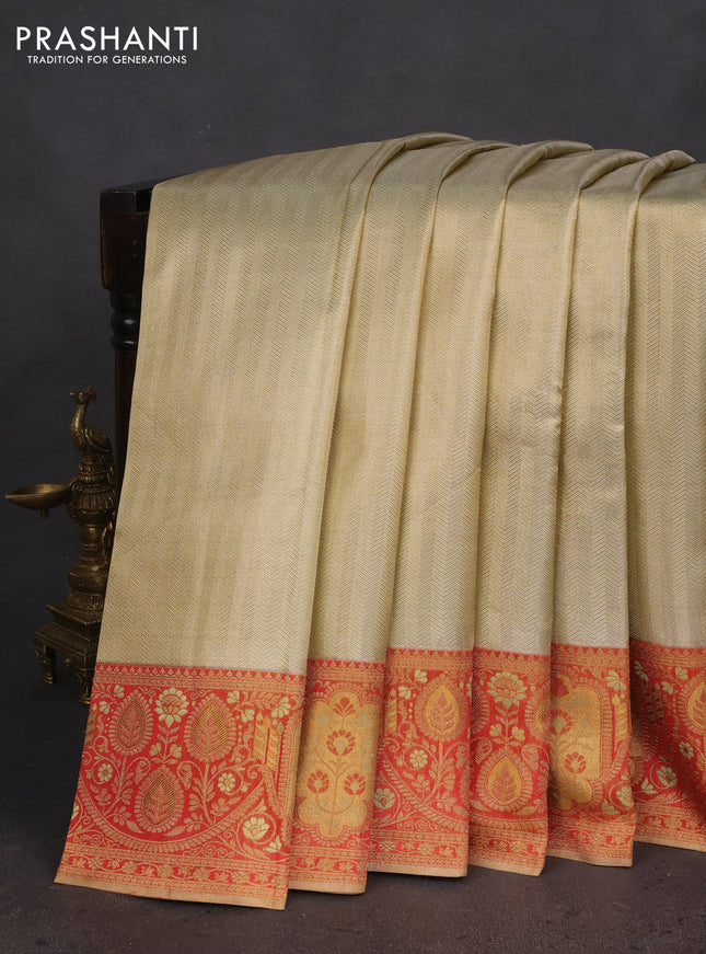 Pure kanchipuram tissue silk saree mild pista green and red with allover zari woven brocade weaves and rich zari woven border