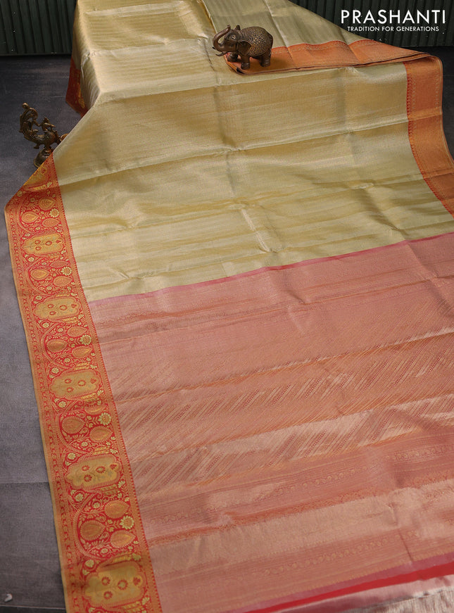 Pure kanchipuram tissue silk saree mild pista green and red with allover zari woven brocade weaves and rich zari woven border