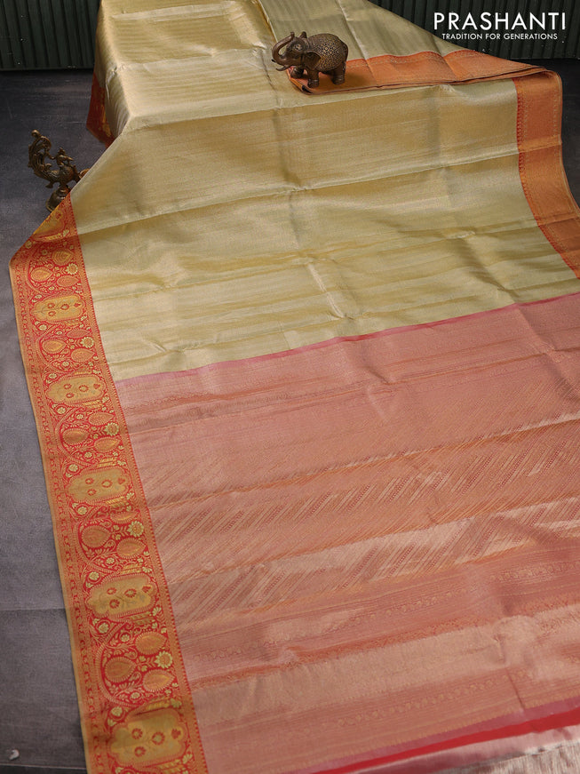 Pure kanchipuram tissue silk saree mild pista green and red with allover zari woven brocade weaves and rich zari woven border