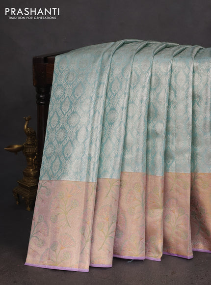 Pure kanchipuram tissue silk saree pastel blue and violet with allover silver zari woven brocade weaves and rich zari woven border