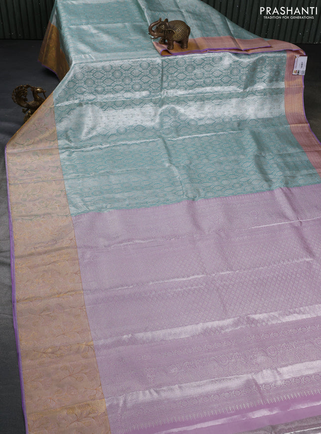 Pure kanchipuram tissue silk saree pastel blue and violet with allover silver zari woven brocade weaves and rich zari woven border