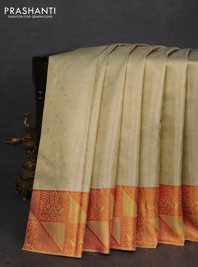 Pure kanchipuram tissue silk saree pista green and red with allover zari woven brocade weaves and rich zari woven border