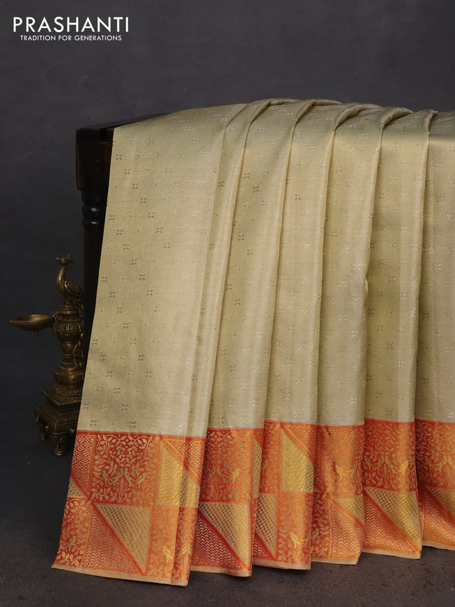 Pure kanchipuram tissue silk saree pista green and red with allover zari woven brocade weaves and rich zari woven border