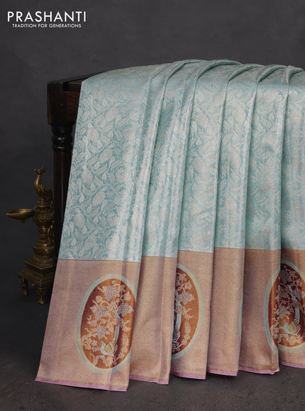 Pure kanchipuram tissue silk saree pastel blue with allover silver zari woven brocade weaves and rich zari woven border