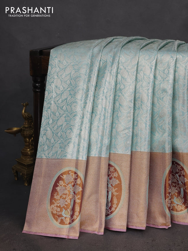 Pure kanchipuram tissue silk saree pastel blue with allover silver zari woven brocade weaves and rich zari woven border
