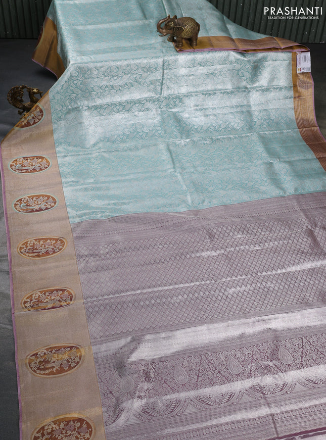Pure kanchipuram tissue silk saree pastel blue with allover silver zari woven brocade weaves and rich zari woven border