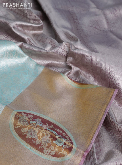 Pure kanchipuram tissue silk saree pastel blue with allover silver zari woven brocade weaves and rich zari woven border