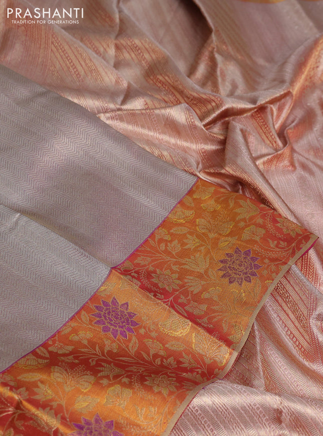 Pure kanchipuram tissue silk saree pastel lavender and dark mustard with allover silver zari woven brocade weaves and rich zari woven border
