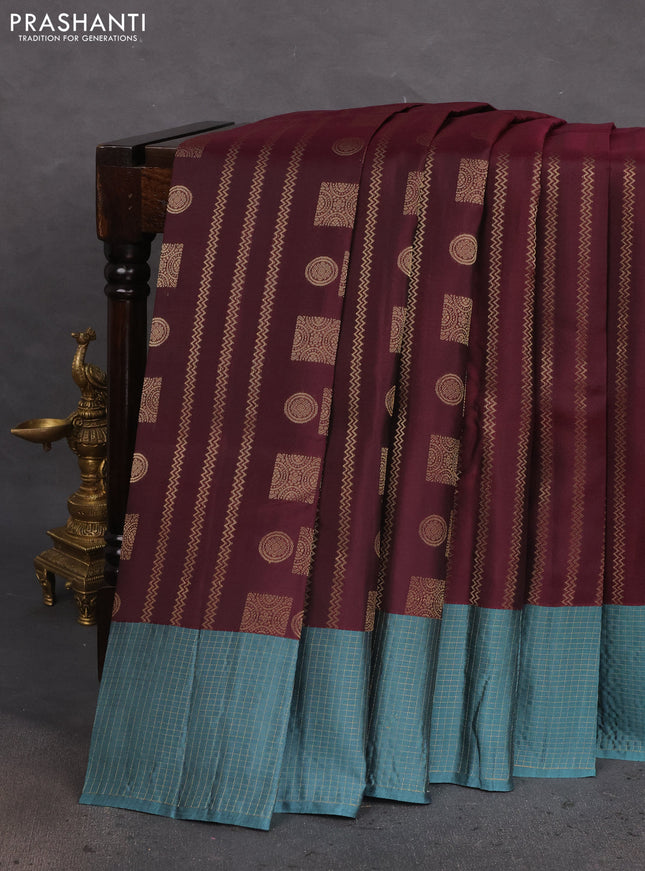Kanchipuram silk saree deep maroon and pastel green with allover zari weaves and zari checked border