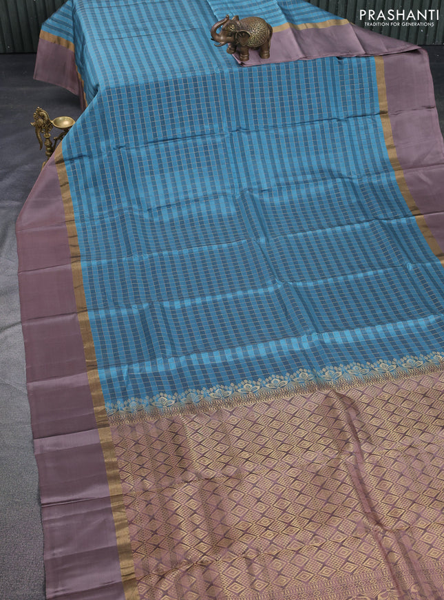 Kanchipuram silk saree pastel blue and brown with allover zari checked pattern and zari woven simple border