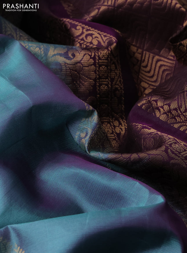 Kanchipuram silk saree teal green and wine shade with zari woven buttas and zari woven butta border