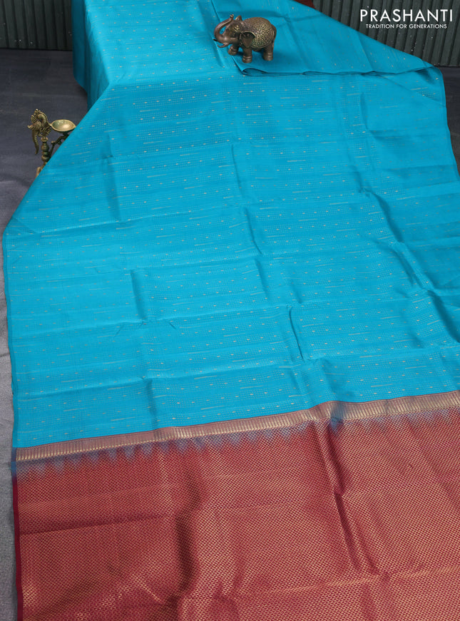 Kanchipuram silk saree teal blue and maroon with allover zari weaves in borderless style