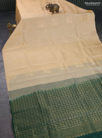 Kanchipuram silk saree pale yellow and green with zari woven buttas in borderless style