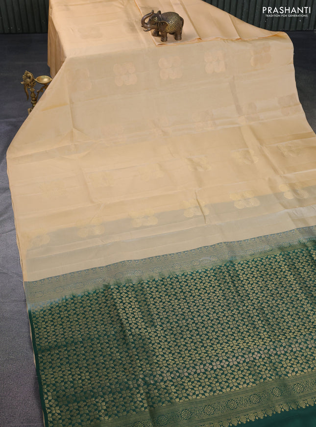Kanchipuram silk saree pale yellow and green with zari woven buttas in borderless style