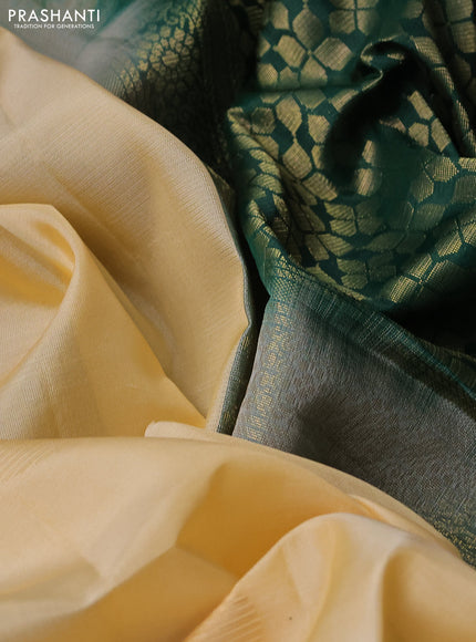Kanchipuram silk saree pale yellow and green with zari woven buttas in borderless style