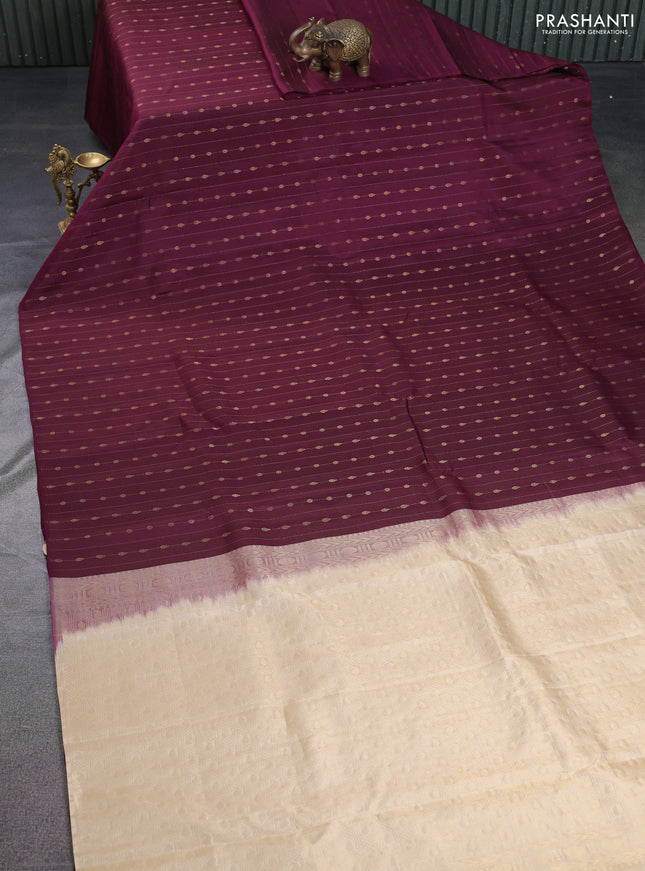 Kanchipuram silk saree wine shade and sandal with allover zari weaves in borderless style
