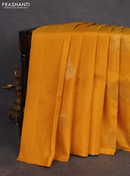 Kanchipuram silk saree mustard yellow and cs blue with zari woven buttas in borderless style