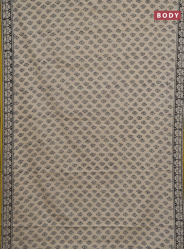 Jaipur cotton saree cream and yellow with allover pailsey buttas and printed border