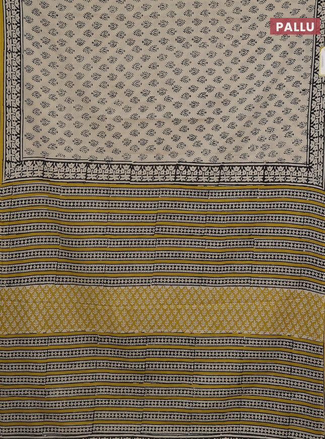 Jaipur cotton saree cream and yellow with allover pailsey buttas and printed border